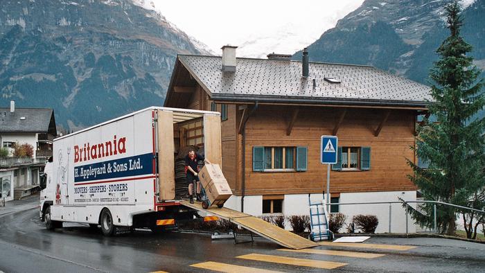 Britannia Appleyards Removals of Yorkshire unloading in Grindelwald Switzerland