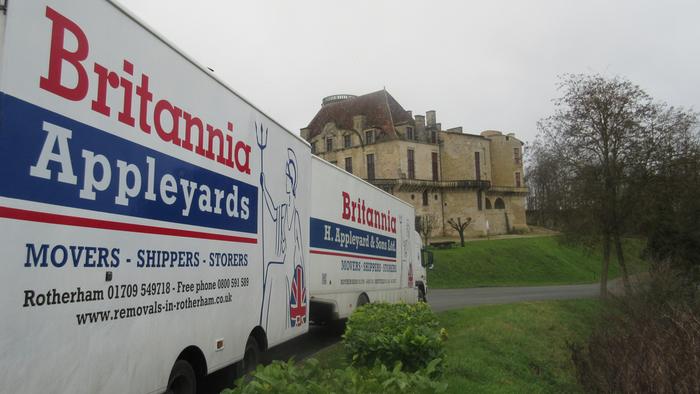 Removal van from Yorkshire parked outside a French chateau