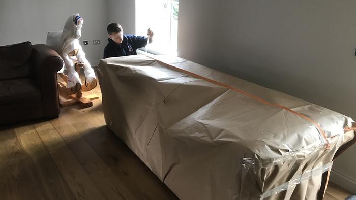 Soft leather settee Export wrapped