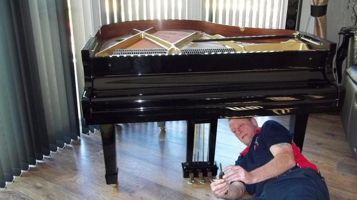 We are trained to dismantle and move Grand pianos
